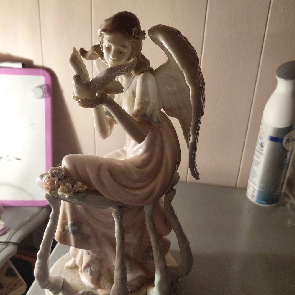 Vintage Porcelen Angel With Dove Sitting On A Railing 12 In Tall 7 In Wide